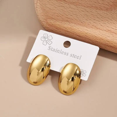 Aretes curvos dorados, acero inoxidable, Bafy joyeria.