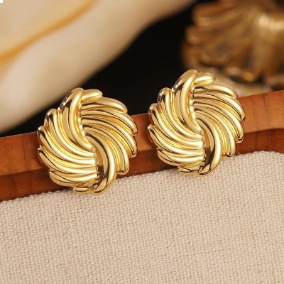  A G O T A D O  Aretes rehilete textura, acero inoxidable, Bafy joyeria.